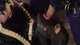 Miss Maskerade Latex couple blowjob and bondage in full rubber with master and slave