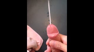 Playing with my precum before I spray a big load of cum