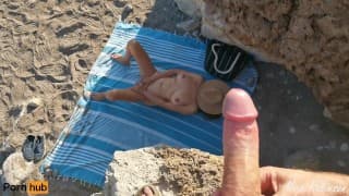 Voyeur jerks off at the beach on masturbating Milf