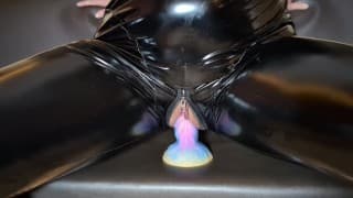 Girl in latex jerk hatd her plump pussy with colored dildo for daddy's big cock